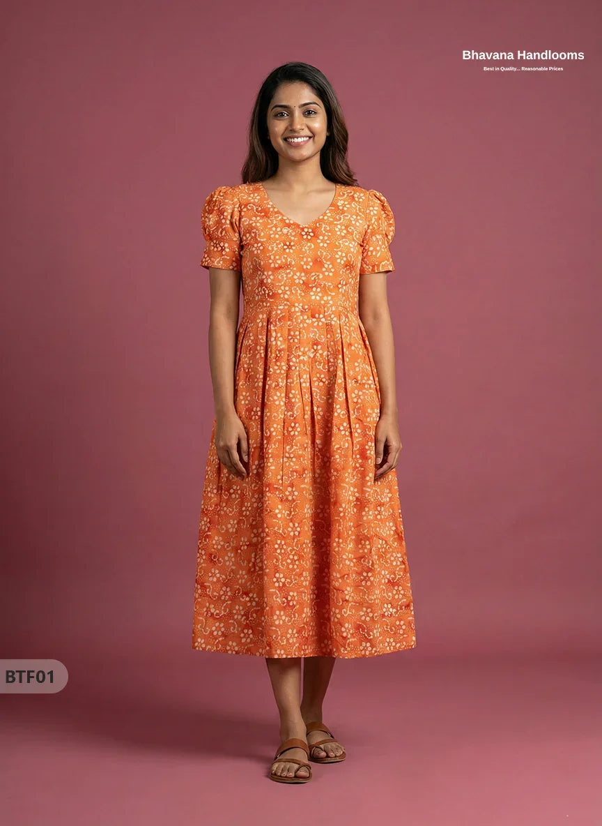 Handmade Batik Frock with Natural Dye – Potli Ball Neck Design Orange Colour