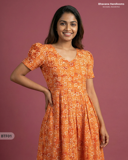 Handmade Batik Frock with Natural Dye – Potli Ball Neck Design Orange Colour