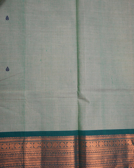 Premium Kanchi Handloom Cotton Saree in Pista Green with Traditional Black Buttas & Rich Copper Zari Border