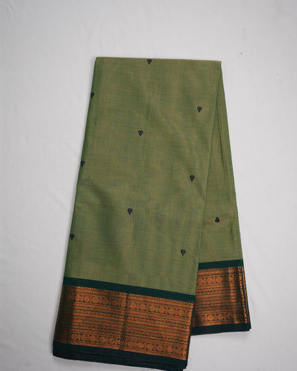 Premium Kanchi Handloom Cotton Saree in Pista Green with Traditional Black Buttas & Rich Copper Zari Border