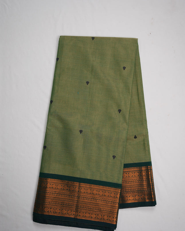 Premium Kanchi Handloom Cotton Saree in Pista Green with Traditional Black Buttas & Rich Copper Zari Border