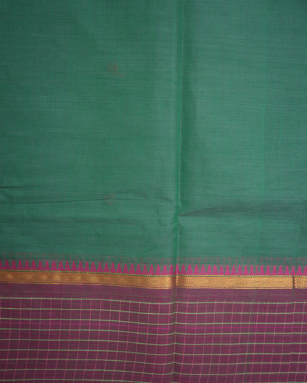 Premium Kanchi Handloom Cotton Saree in Deep Bottle Green with Rani Pink Butta Motifs & Contrast Plum Purple Checked Border