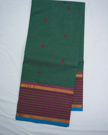 Premium Kanchi Handloom Cotton Saree in Deep Bottle Green with Rani Pink Butta Motifs & Contrast Plum Purple Checked Border