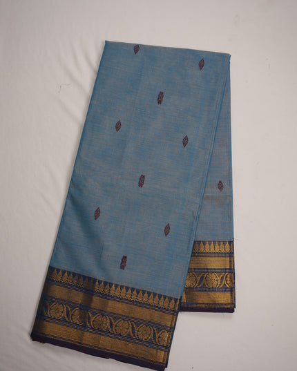 Premium Kanchi Handloom Cotton Saree in Powder Sky Blue with Traditional Butta Motifs & Rich Gold Zari Navy Blue Border