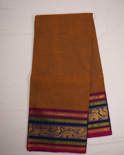 Premium Kanchi Handloom Cotton Saree in Rustic Mustard Brown with Rich Gold Zari Elephant-Peacock Weaving & Contrast Rani Pink-Emerald Green-Royal Blue Border