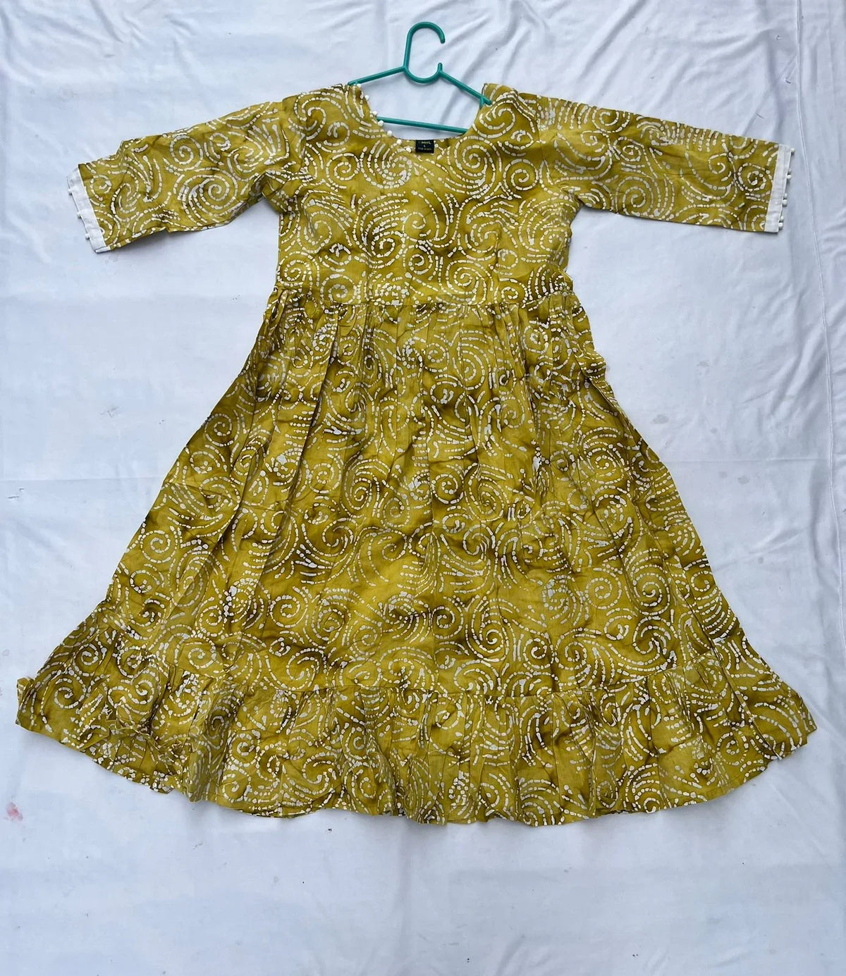Handmade Batik Frock with Natural Dye – Potli Ball Neck Design Yellow Colour