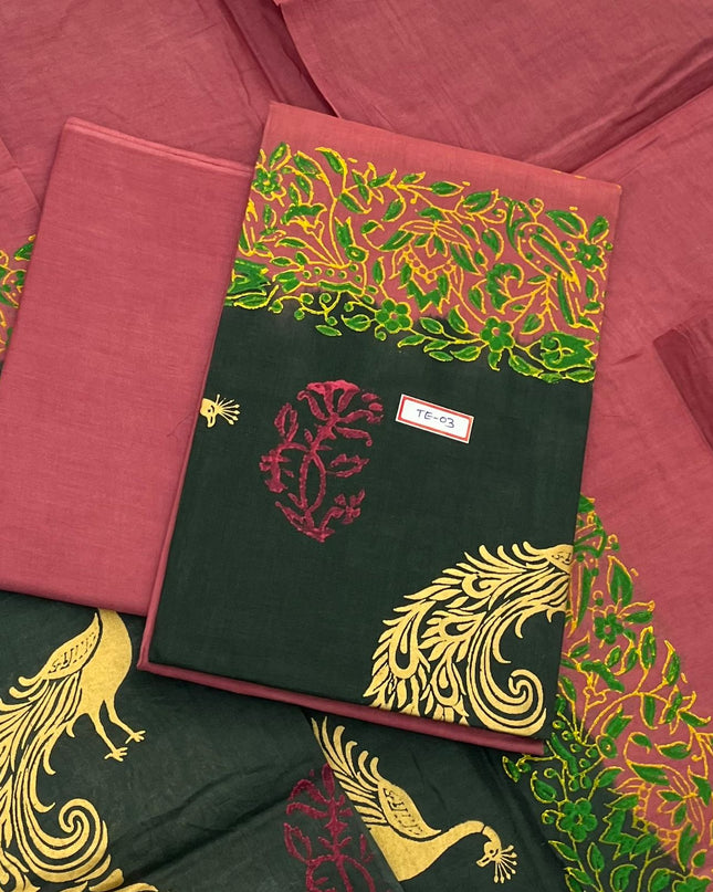 Brownish Red Colour cotton dress material featuring a beautifully crafted peacock design.
