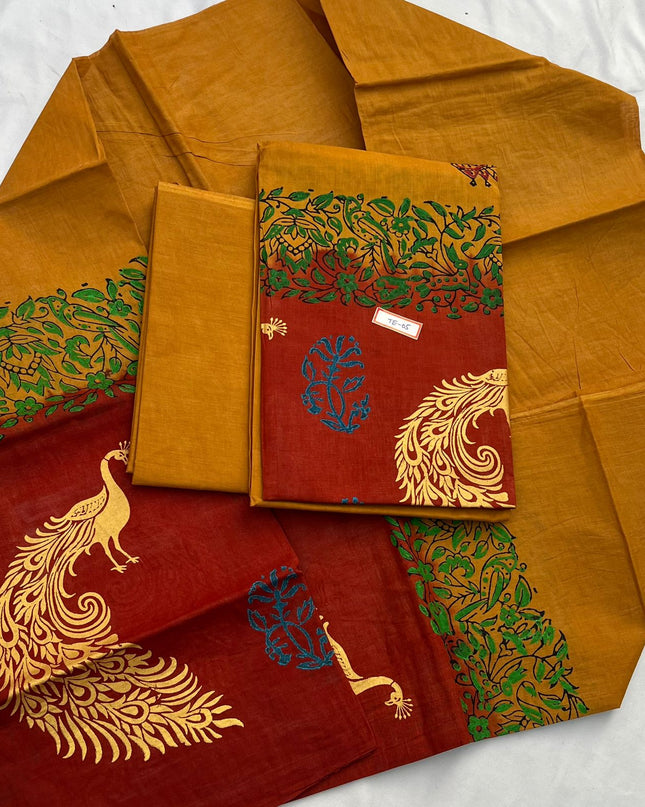 Orange Brown Colour cotton dress material featuring a beautifully crafted peacock design.