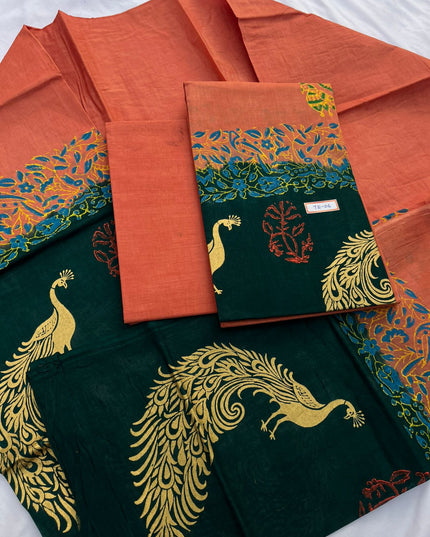 Sunrise Orange Colour cotton dress material featuring a beautifully crafted peacock design.