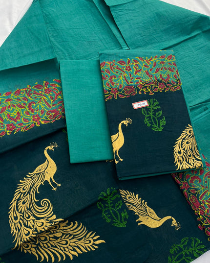 Sea Blue Colour cotton dress material featuring a beautifully crafted peacock design.