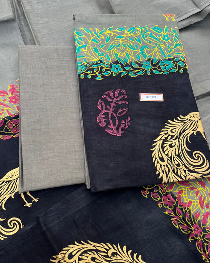 Gray Colour cotton dress material featuring a beautifully crafted peacock design.