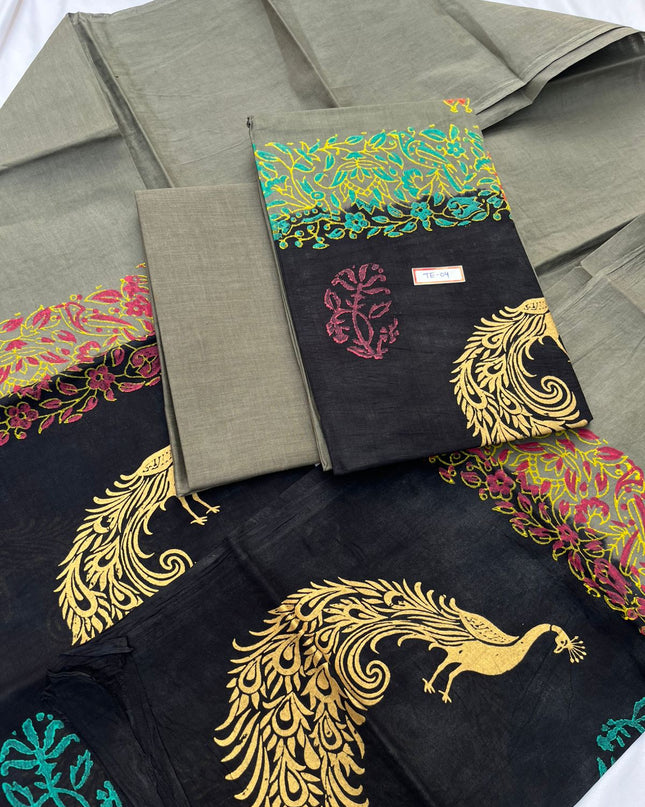 Gray Colour cotton dress material featuring a beautifully crafted peacock design.
