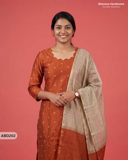 Raw Silk 3-Piece Kurti Set with Cut Work Neck Design in Burnt Rust Orange Colour | Full-Length Lined Kurti with Gold Dupatta