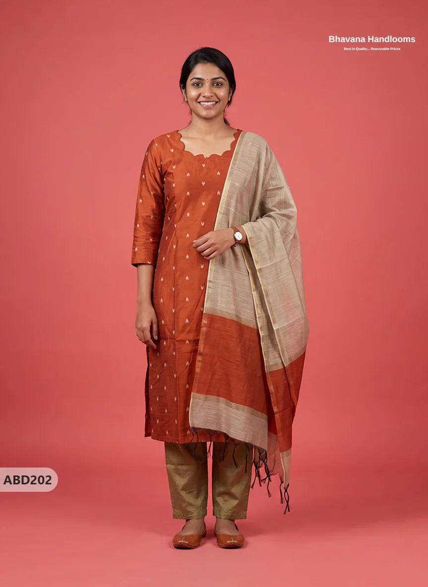 Raw Silk 3-Piece Kurti Set with Cut Work Neck Design in Burnt Rust Orange Colour | Full-Length Lined Kurti with Gold Dupatta