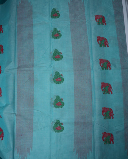 Bhavana Handlooms aqua blue Coimbatore handloom saree featuring red and green elephant motifs and teal woven border.
