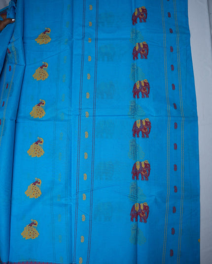 Bhavana Handlooms aqua blue handloom saree featuring traditional peacock motifs and a contrast rani pink woven border.