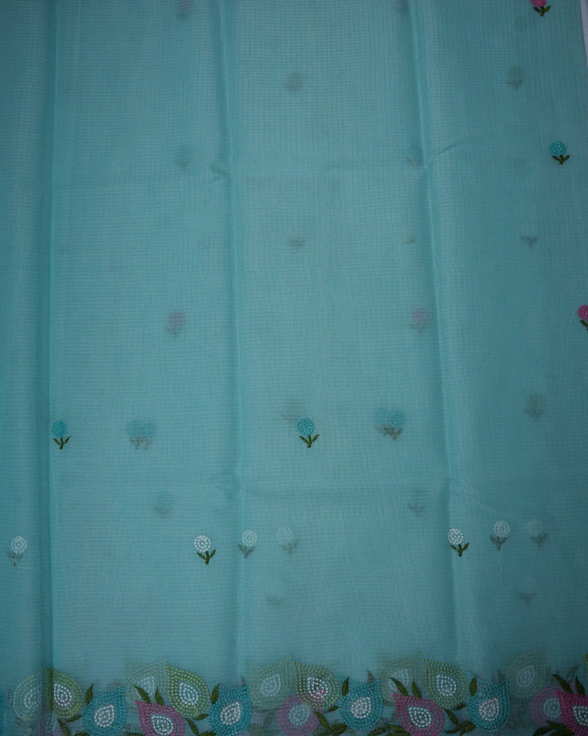 Bhavana Handlooms aqua blue silk kota saree featuring delicate floral embroidery and a multicolor designer border.