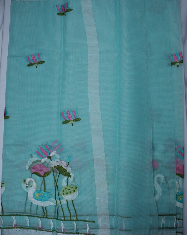 Bhavana Handlooms aqua blue silk kota saree featuring delicate swan and lotus embroidery and an elegant border.