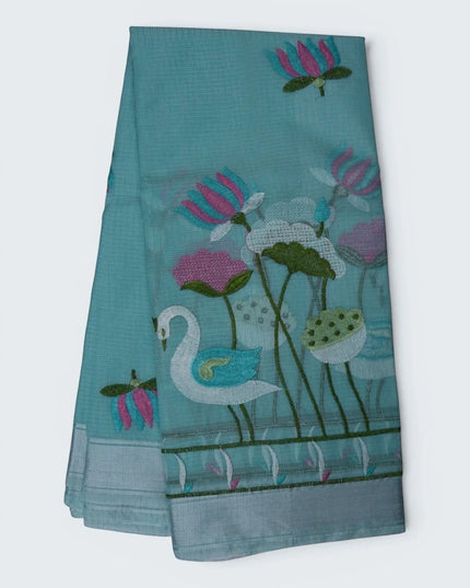 Bhavana Handlooms aqua blue silk kota saree featuring intricate swan and lotus embroidery and a decorative border