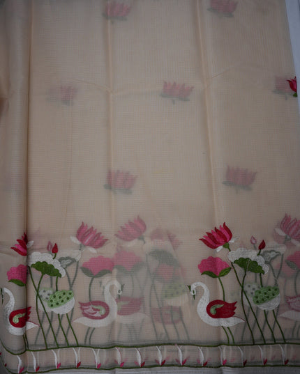 Bhavana Handlooms beige silk Kota saree featuring intricate swan and lotus embroidery and an elegant border.