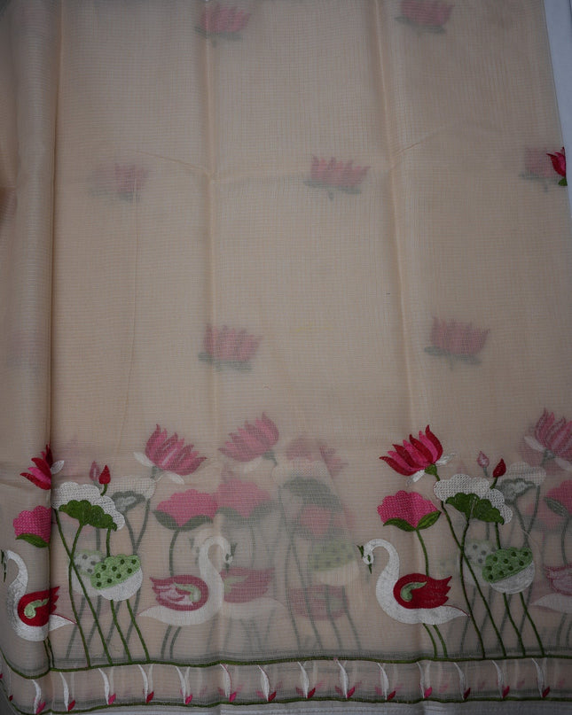 Bhavana Handlooms beige silk Kota saree featuring intricate swan and lotus embroidery and an elegant border.