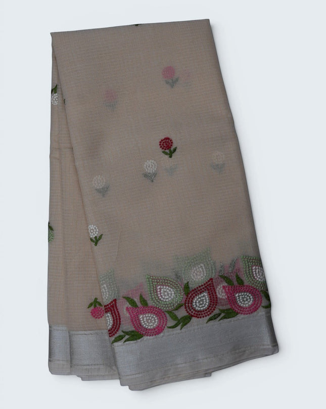 Bhavana Handlooms beige silk Kota saree featuring delicate floral embroidery motifs and a multicolor designer border.