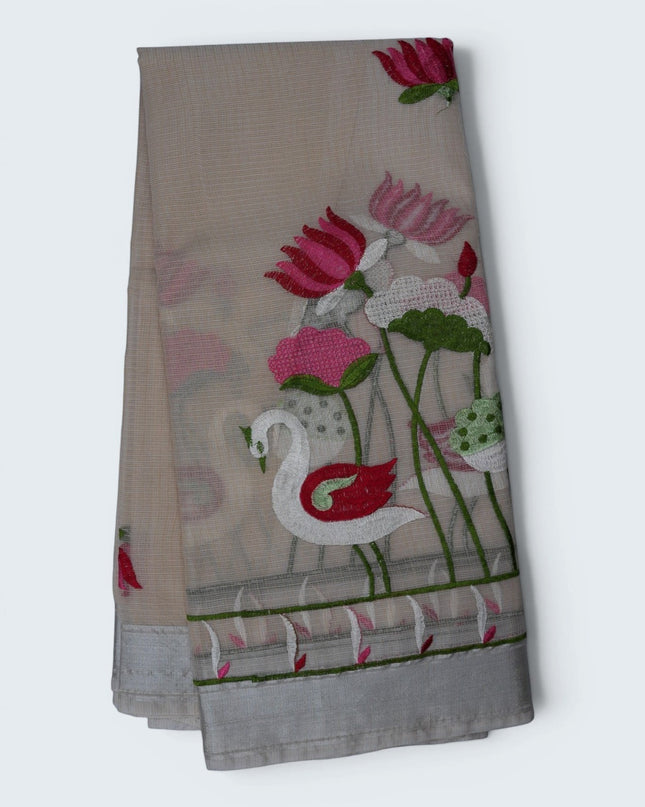 Bhavana Handlooms beige silk Kota saree featuring intricate swan and lotus embroidery with a detailed floral border