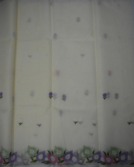 Bhavana Handlooms beige silk Kota saree featuring delicate floral embroidery motifs and a multicolor designer border.