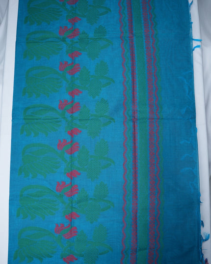 Bhavana Handlooms blue cotton saree with green floral patterns and pink woven border details
