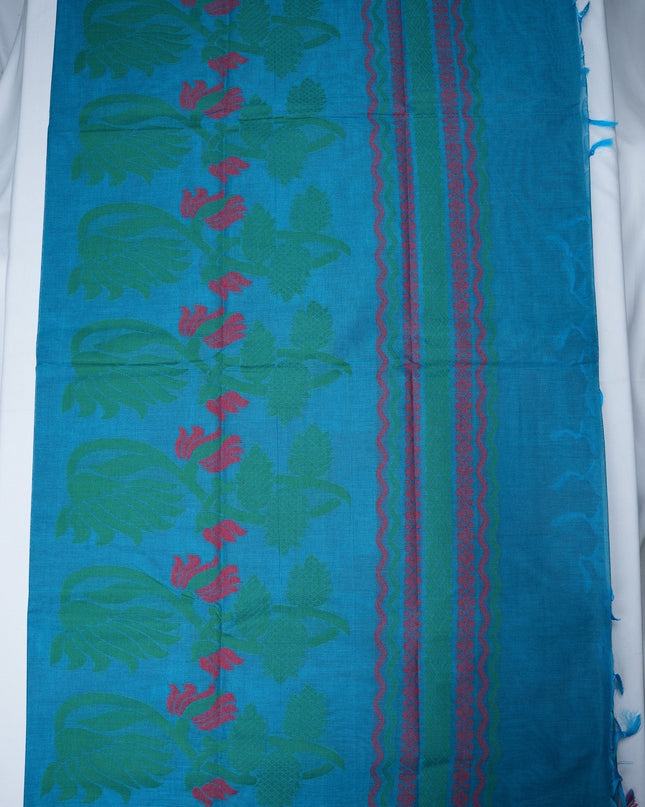Bhavana Handlooms blue cotton saree with green floral patterns and pink woven border details