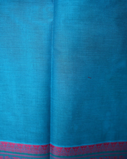 Bhavana Handlooms blue handloom saree with a pink and teal traditional woven border featuring elephant motifs.