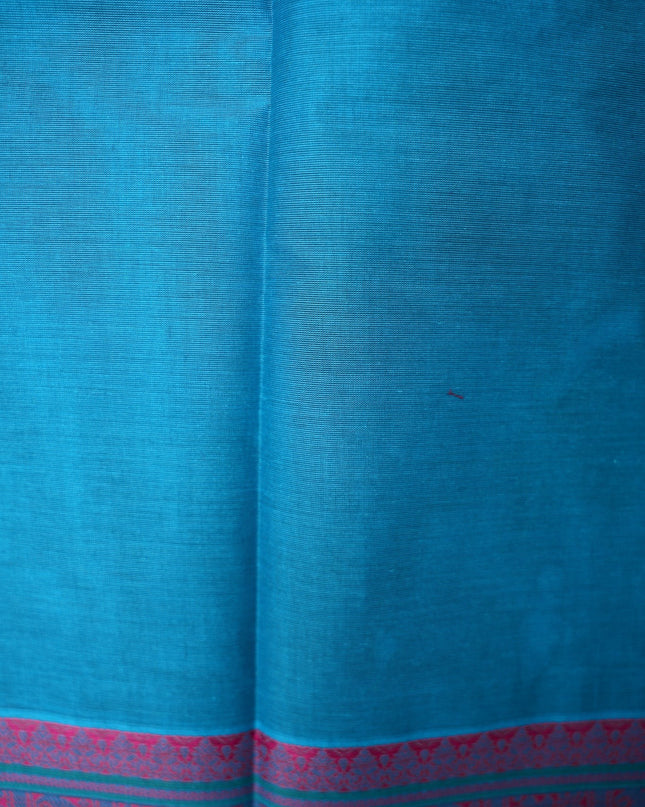 Bhavana Handlooms blue handloom saree with a pink and teal traditional woven border featuring elephant motifs.