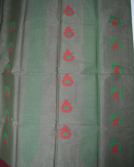 Bhavana Handlooms charcoal grey Coimbatore handloom saree with rani pink border and traditional elephant motifs.