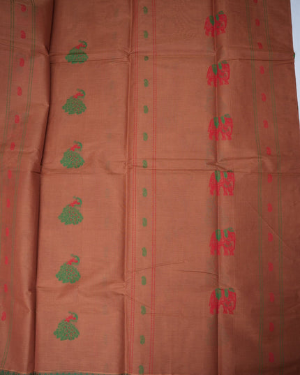 Bhavana Handlooms copper brown handloom saree with green peacock motifs and a contrast rani pink woven border