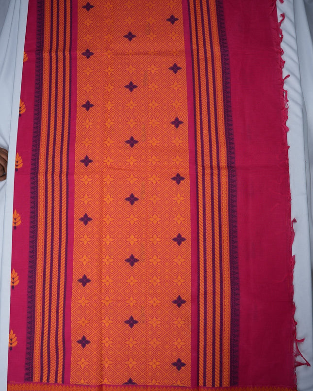 Bhavana Handlooms Coimbatore handloom saree in rani pink and orange with traditional floral butta motifs and zari border