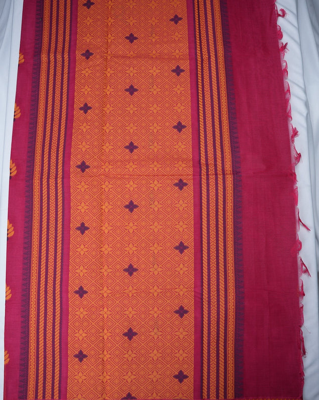 Bhavana Handlooms Coimbatore handloom saree in rani pink with orange geometric patterns and traditional floral buttas.
