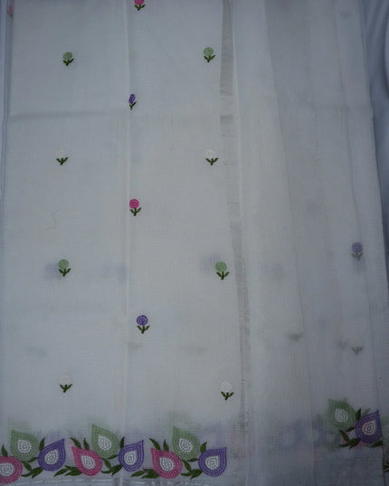 Bhavana Handlooms ivory white silk Kota saree featuring multicolor floral embroidery and elegant silver zari border.