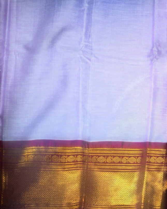 Bhavana Handlooms lavender lilac mercerized cotton saree with gold zari border. Lightweight and soft finish.