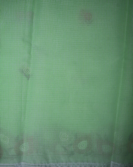 Bhavana Handlooms mint green silk kota saree featuring delicate floral embroidery motifs and a woven border.