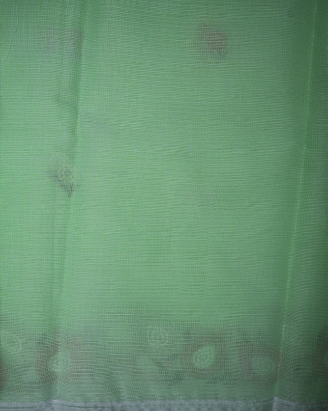 Bhavana Handlooms mint green silk kota saree featuring delicate floral embroidery motifs and a woven border.