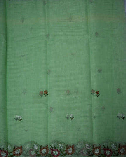 Bhavana Handlooms mint green silk Kota saree featuring delicate floral embroidery and a multicolor designer border.