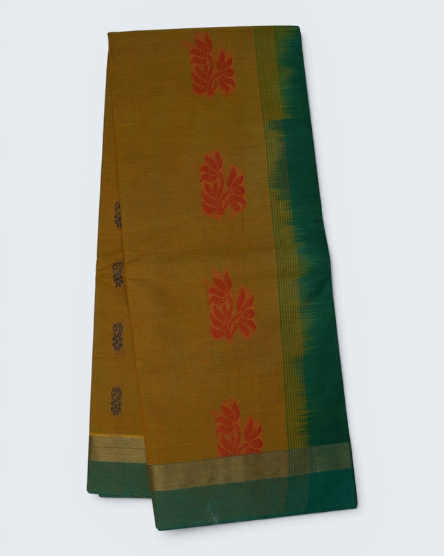 Bhavana Handlooms mustard yellow Coimbatore handloom saree featuring traditional red floral butta motifs and green border