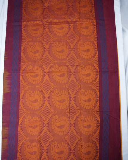 Bhavana Handlooms mustard yellow Coimbatore handloom saree featuring traditional floral butta motifs and maroon borders