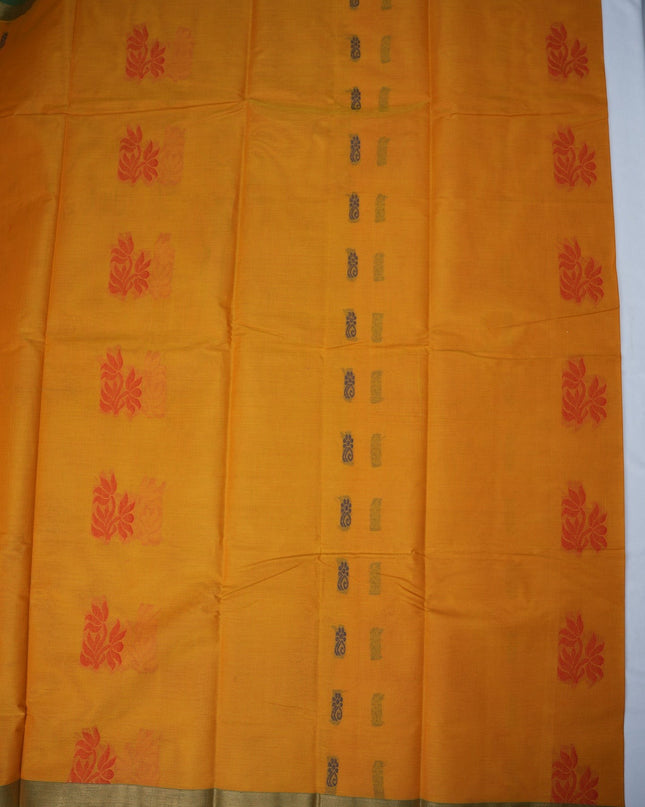 Bhavana Handlooms mustard yellow Coimbatore handloom saree with red floral butta motifs and green border
