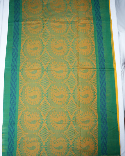 Bhavana Handlooms mustard yellow Coimbatore handloom saree with traditional floral motifs and aqua blue woven border