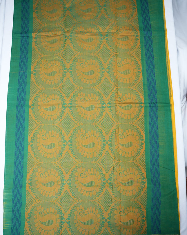 Bhavana Handlooms mustard yellow Coimbatore handloom saree with traditional floral motifs and aqua blue woven border