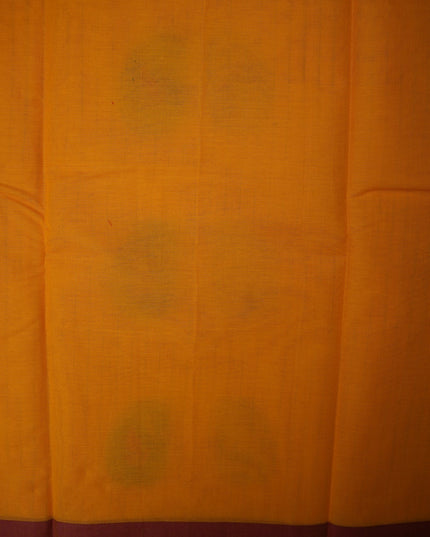 Bhavana Handlooms mustard yellow Coimbatore handloom saree with a contrasting maroon woven border
