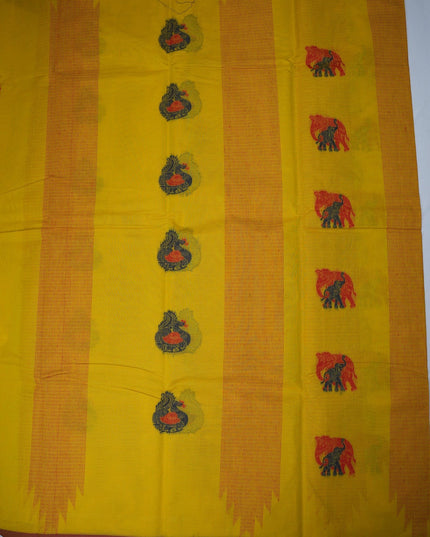 Bhavana Handlooms mustard yellow Coimbatore handloom saree with traditional elephant motifs and maroon woven border.
