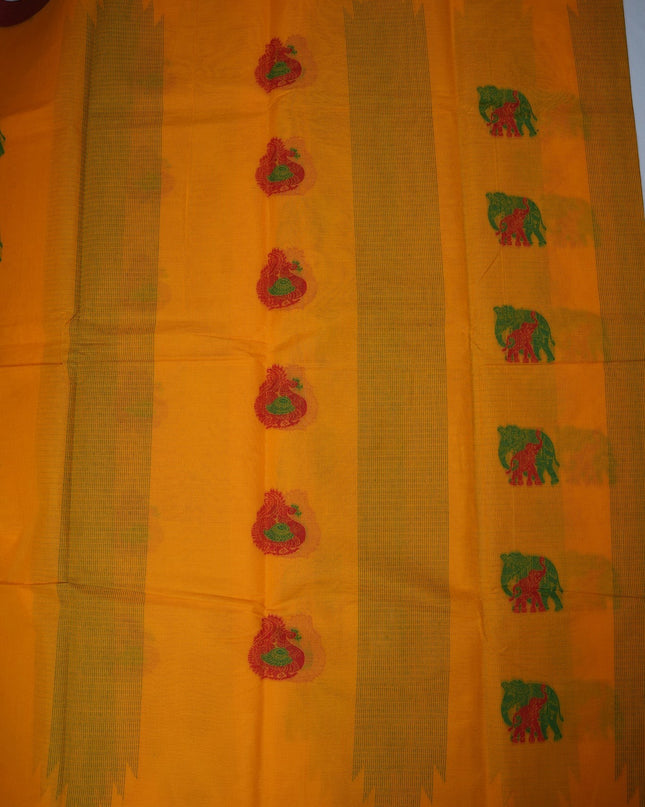 Bhavana Handlooms mustard yellow Coimbatore handloom saree featuring traditional elephant motifs and maroon border.