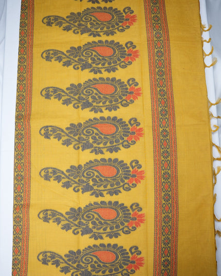 Bhavana Handlooms mustard yellow handloom saree with grey and orange paisley motifs and a rust woven border.